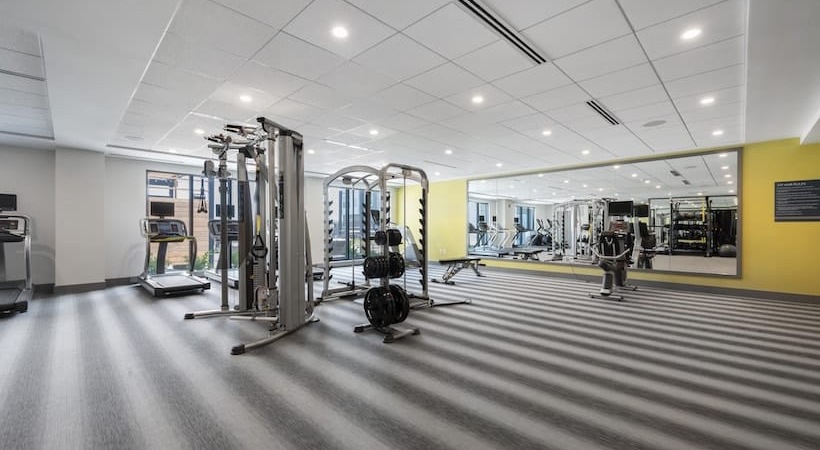 fitness center fitness center with large open spaces allowing room for workouts and for using equipment
